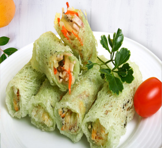 Frozen vegetable roll wrapped in crispy, netted rice paper with a savory vegetable filling—ideal for quick snacks or appetizers
